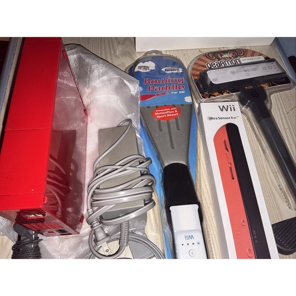 wii console ,power Cord ,new Ultra Sensor Bar ,2 New Sport Paddles , - Picture 6 of 6